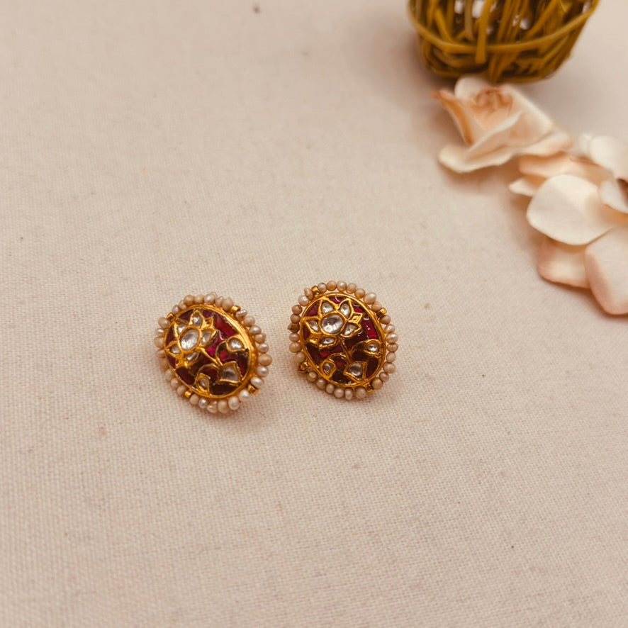 Red and white kundan oval studs