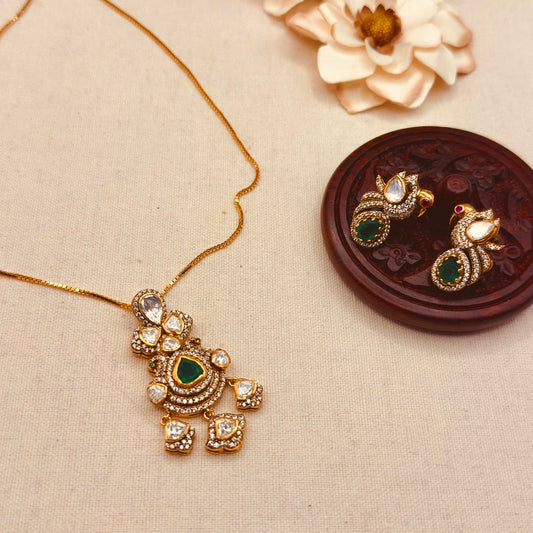 Moissanite and Emerald pendant set