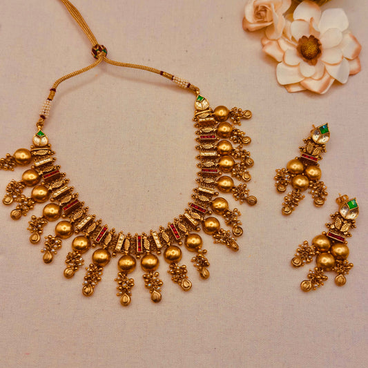 Antique red and white kundan vadki set